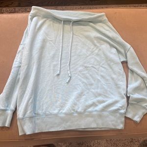 Woman’s off the shoulders sweater!